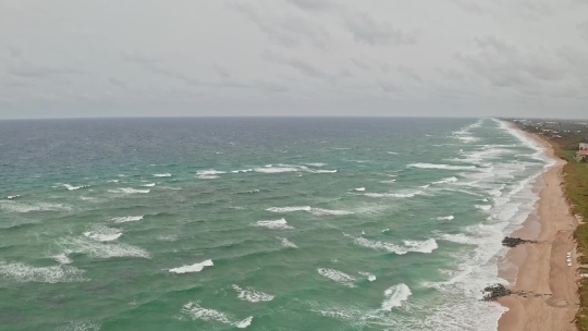 Beach waves white capping